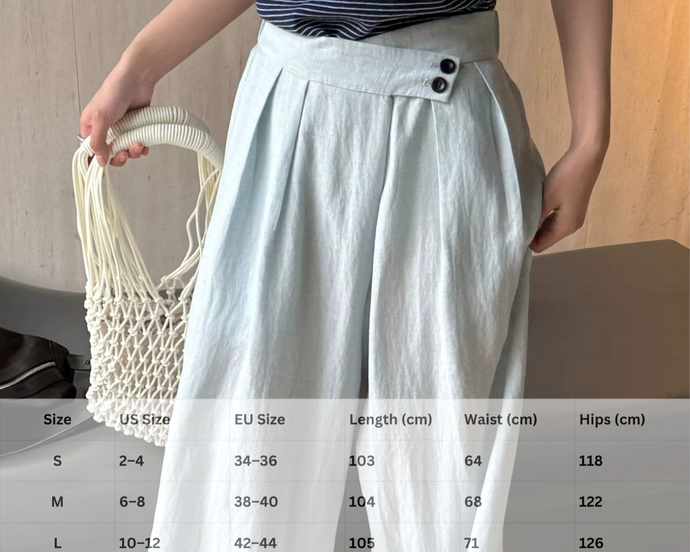 Livia Asymmetric Button Linen-Blend Trousers